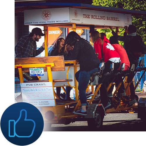Happy people riding a pedal pub with like icon representing Tour Marketing Suite managing your reviews.